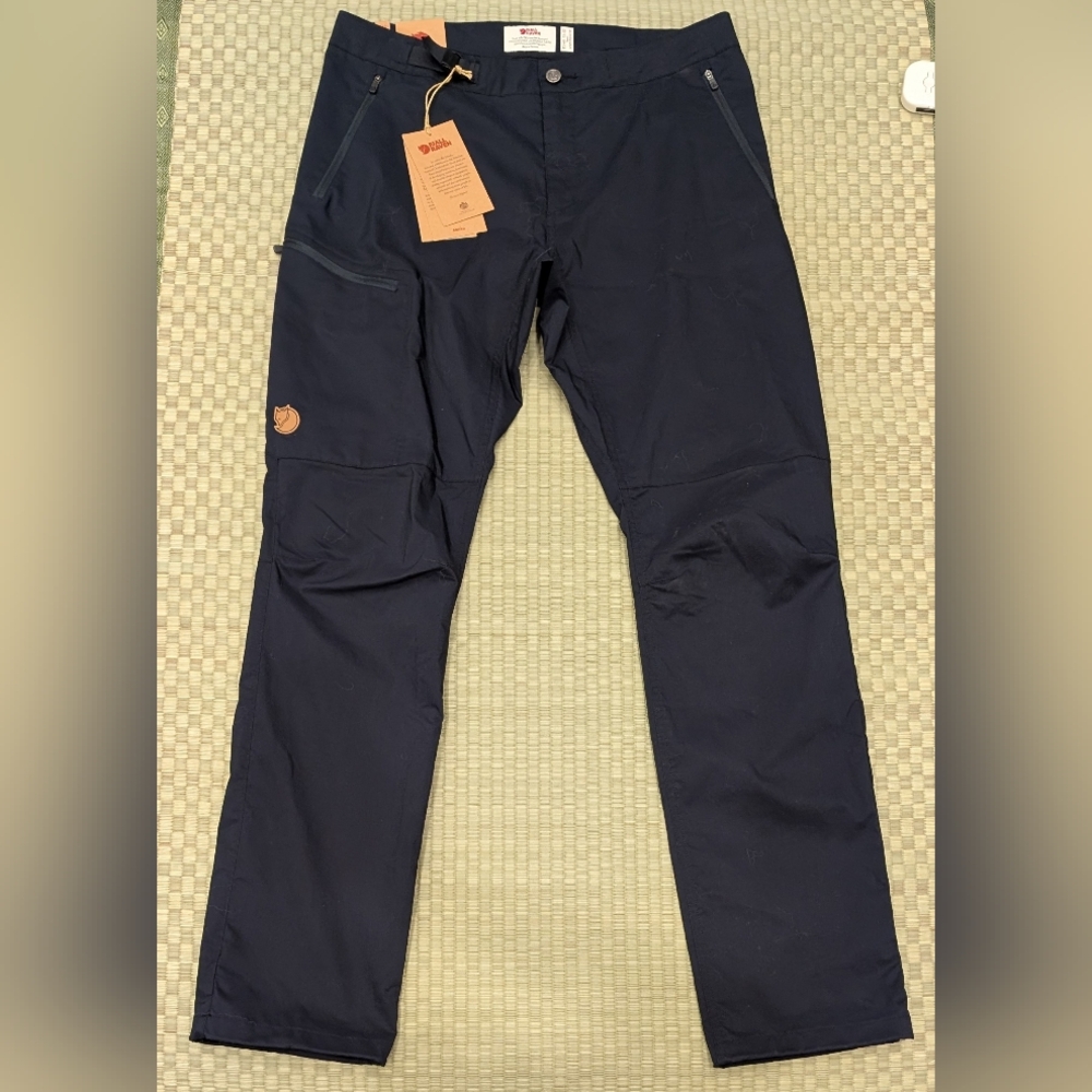Fjallraven Men's Cargo Pants in Navy with Orange Logo Tag